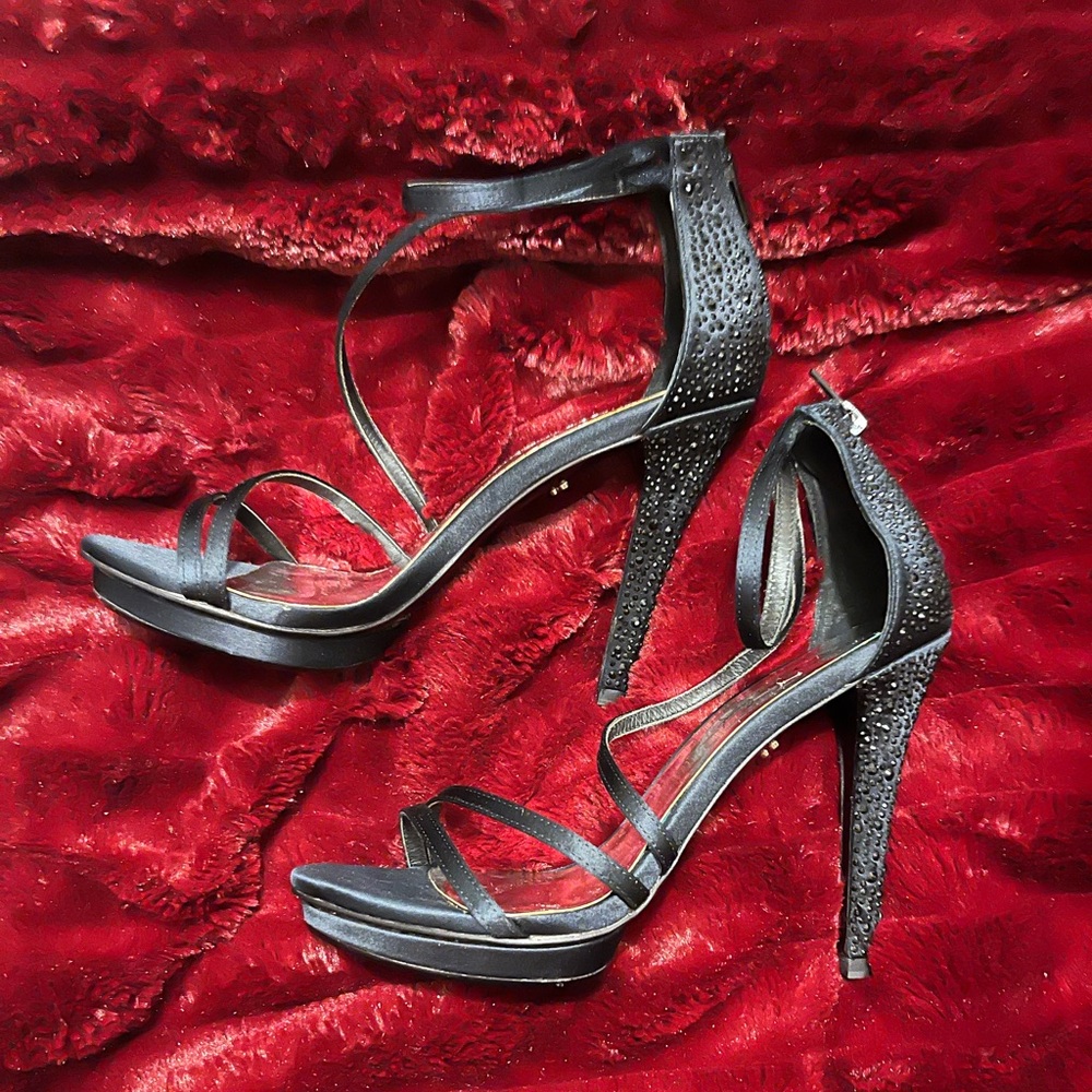 Strappy Satin heels.